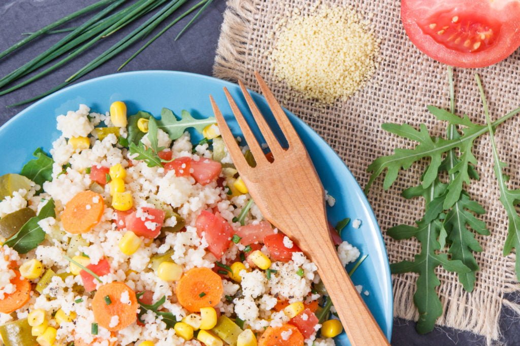 Fresh salad with couscous and vegetables as best nutritious food