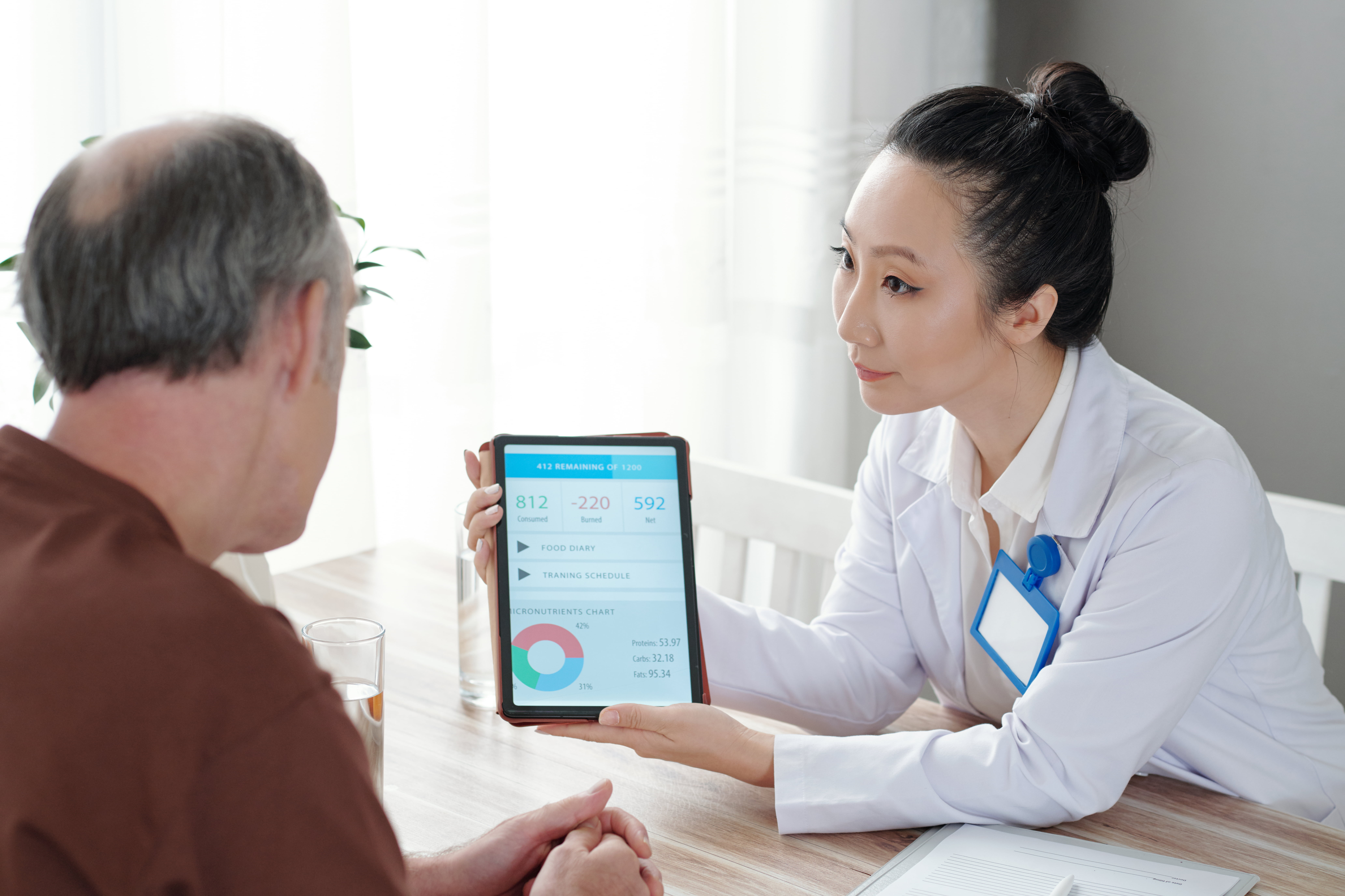 Physician Showing Healthcare App